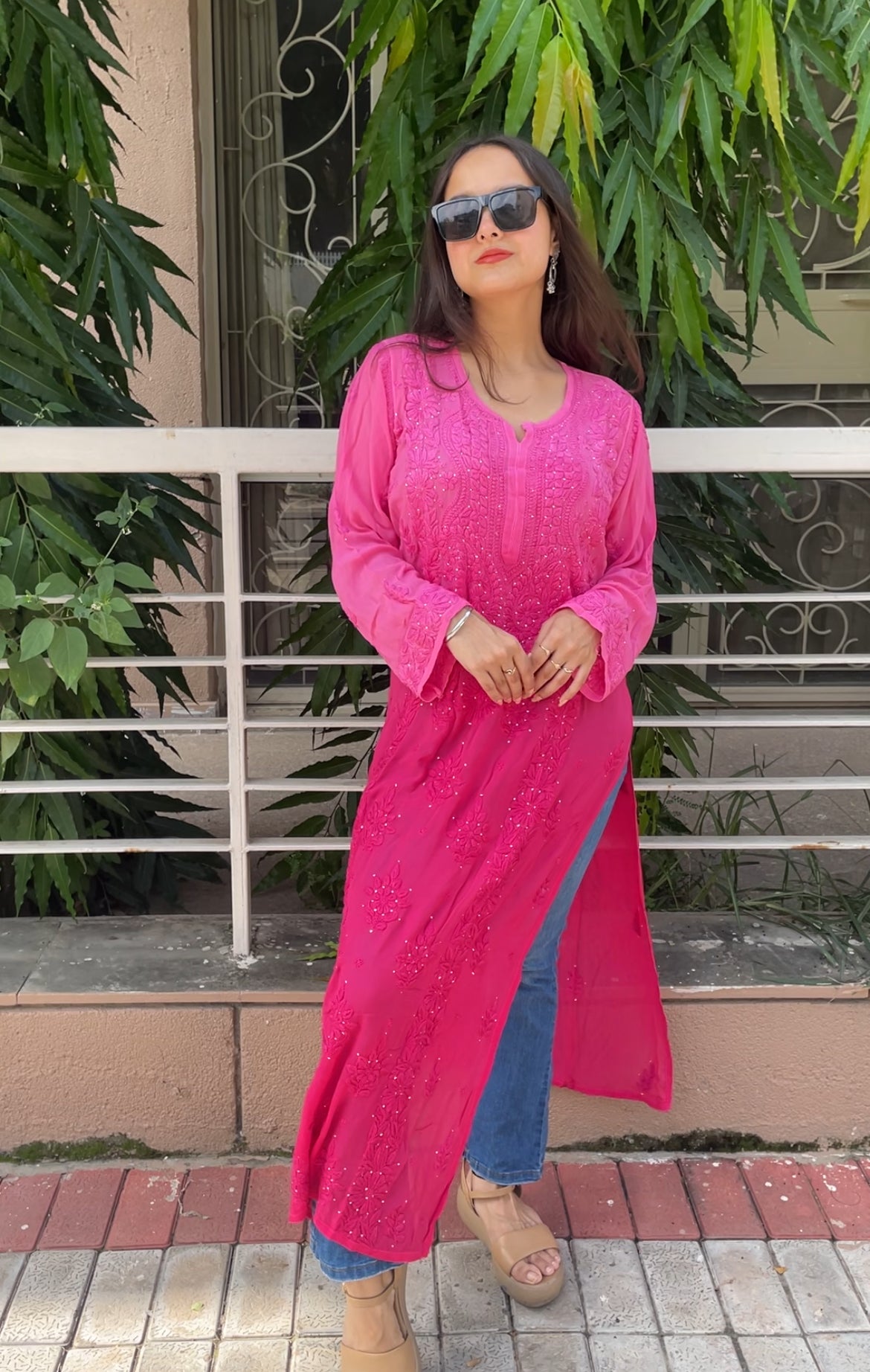 “Handcrafted Chikankari in a bold hot pink statement.”