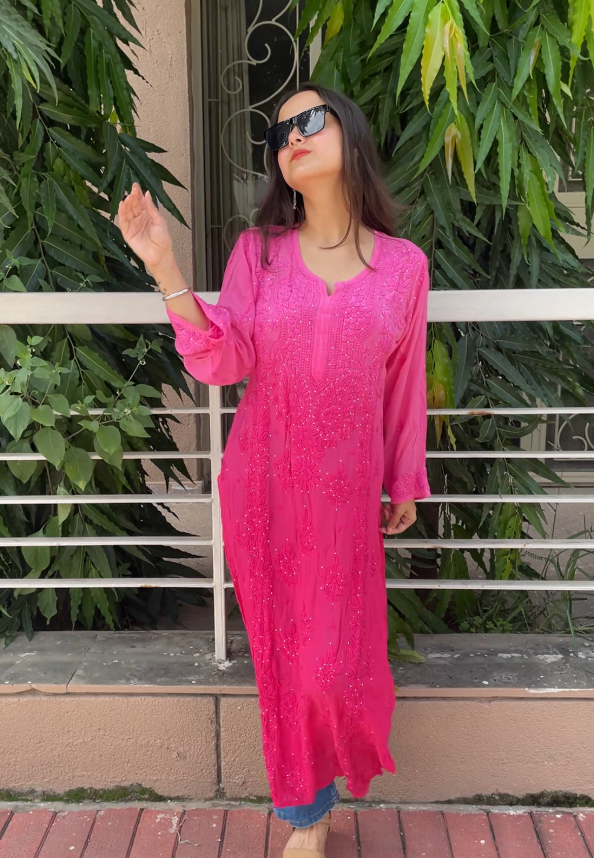 “Handcrafted Chikankari in a bold hot pink statement.”